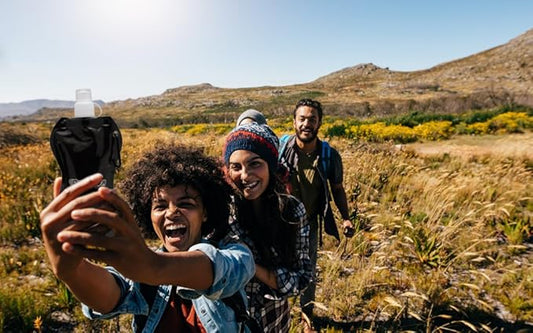 Collapsible Reusable Water Bottle with Carabiner Clip by Activiva - Light Weight Leak Proof Foldable Drinking Water Bottle - Non-Toxic BPA Free - 16.9 oz - 4 Pack