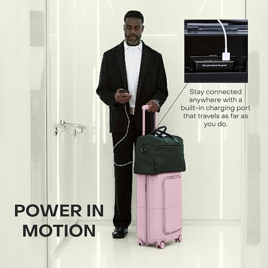 July Carry On Pro - 20" Hardshell with Front Pocket, Airline Approved Carry On Luggage with Wheels, TSA Lock Rolling Suitcase, Silent Spinner Wheels, USB Ports & Ejectable Battery - Blush Pink