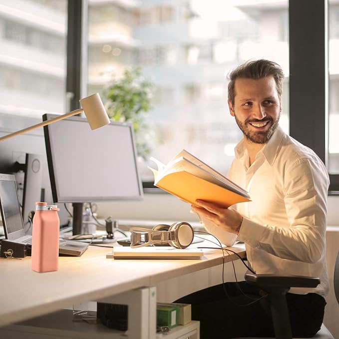 E-Senior Collapsible Water Bottle BPA Free - 20 oz Foldable Water Bottle for Travel Sports Bottles with Triple Leak Proof Lightweight (Orange)