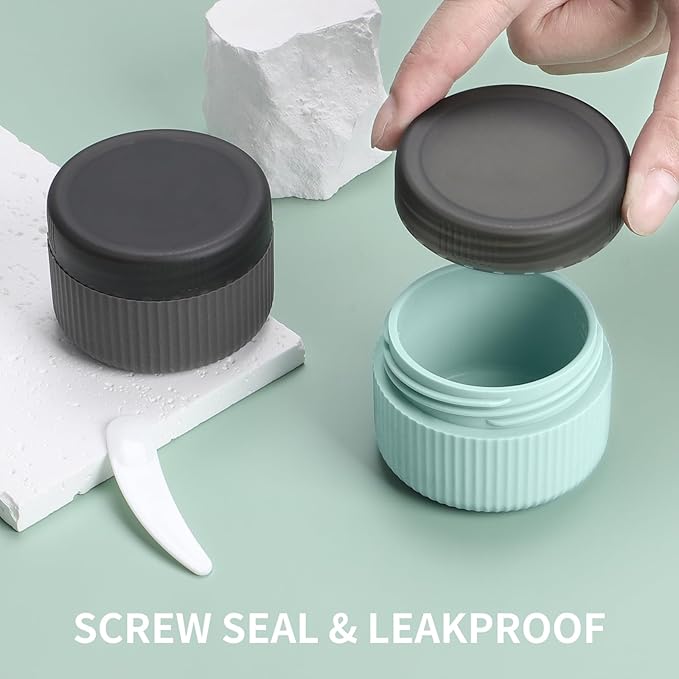 ME.FAN Travel Containers for Toiletries, TSA Approved 1.5 oz Silicone Cream Jars, Leak-proof Journey Containers, Trip Accessories with Lid for Cosmetic Face Hand Body Cream 4 Pack Black Lid - Grey