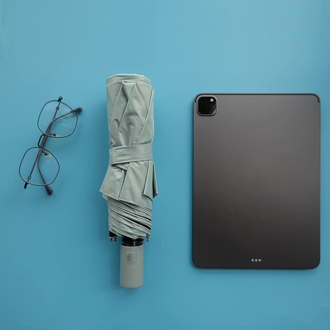 BAODINI Small UV Protection Travel Umbrella Compact for Rain and Sun UPF 50+ Windproof Portable 42 inch Umbrella for Women and Men