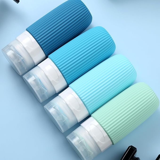 Travel Bottles for Toiletries, Tsa Approved 2oz Travel Bottles, BPA Free Leak Proof Travel Size Toiletry Containers, Refillable Travel Accessories with Toiletry Bag for Shampoo Liquid (4 Pack)