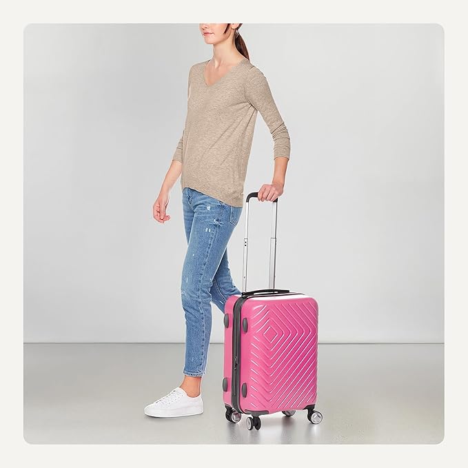 Amazon Basics 21" Hardside Carry-On Luggage with TSA Lock, Hardshell Suitcase With Wheels, Expandable For 25% More Capacity, With Scratch-Resistant Geometric Surface, 4 Multi-directional Wheels, Pink