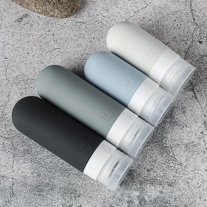 16 Pack Travel Bottles Set - TSA Approved Leak Proof Silicone Squeezable Containers for Toiletries, Conditioner, Shampoo, Lotion & Body Wash Accessories (Black)